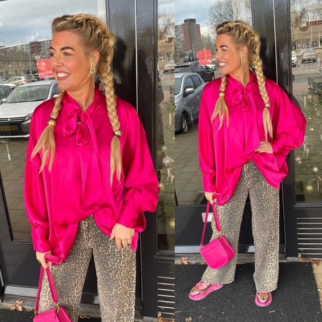 27. Sinna strik blouse fuschia